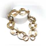 anse chaine de sac à main acrylique marbré beige et boucles étal dorées