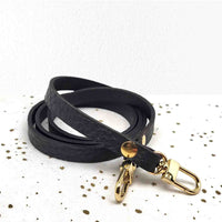 Bandoulière fine pour pochette en cuir grainé NOIR mousquetons dorés